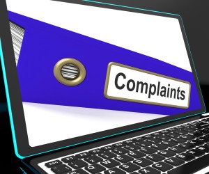 Complaints File On Laptop Shows Complaints Or Moans Records